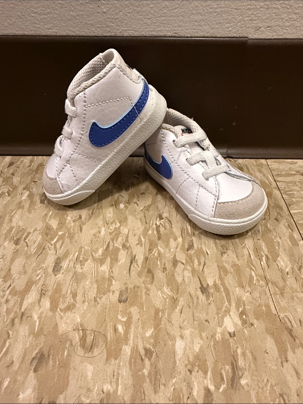 Nike White Kids High-Top Sneakers with Blue Swoosh